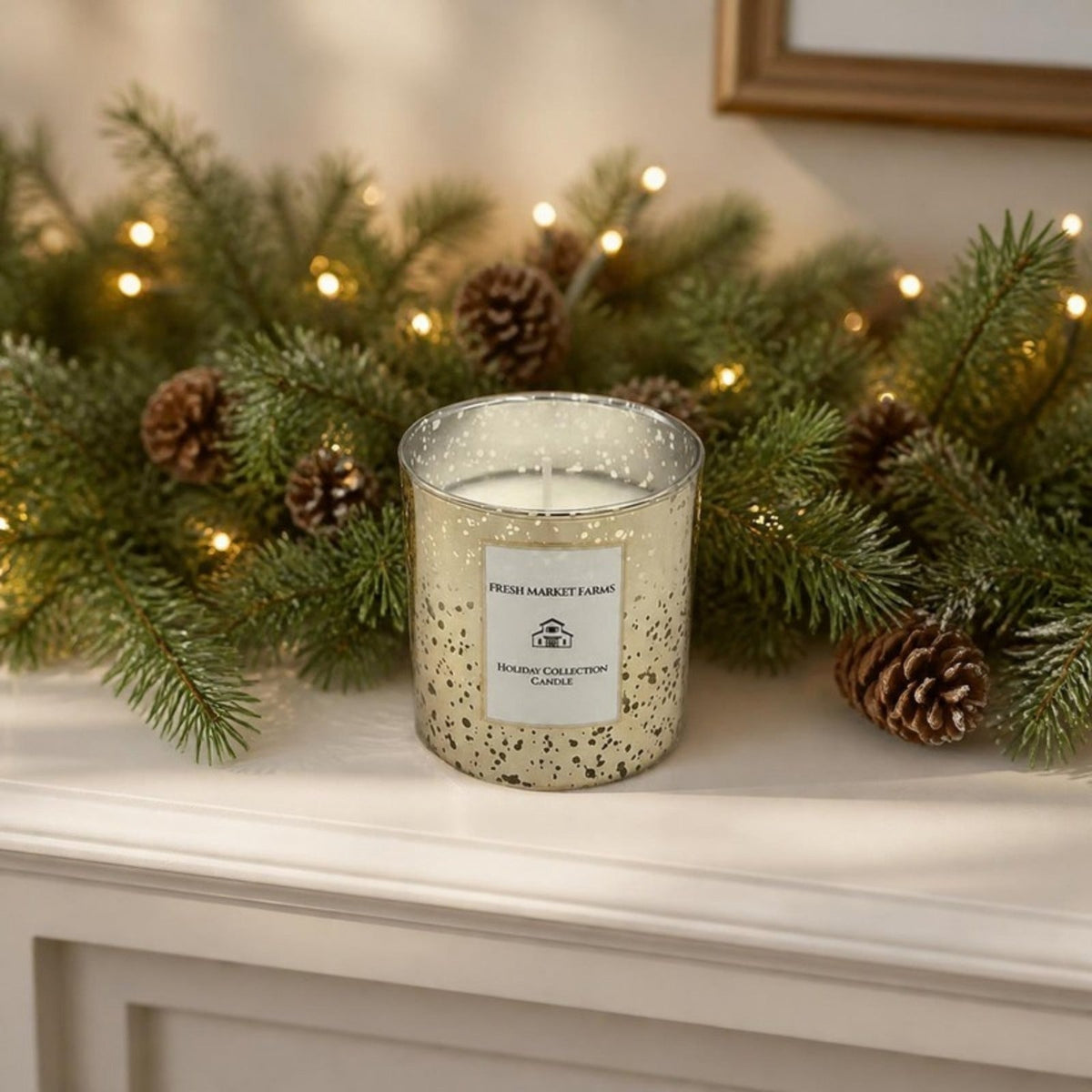 Mercury Glass Gold Candle on a mantel with evergreen garland