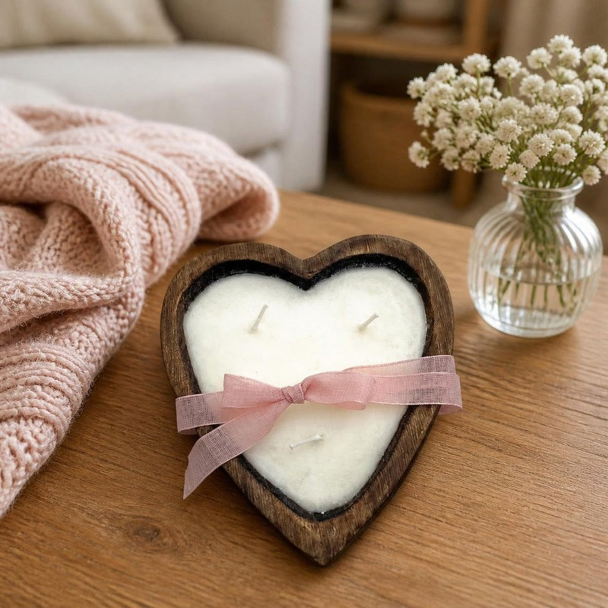 Natural Finish Heart Dough Bowl Candle on a coffee table
