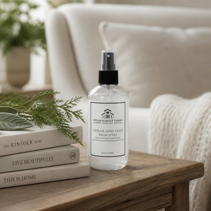 Cedar & Sage Room Spray on a living room side table